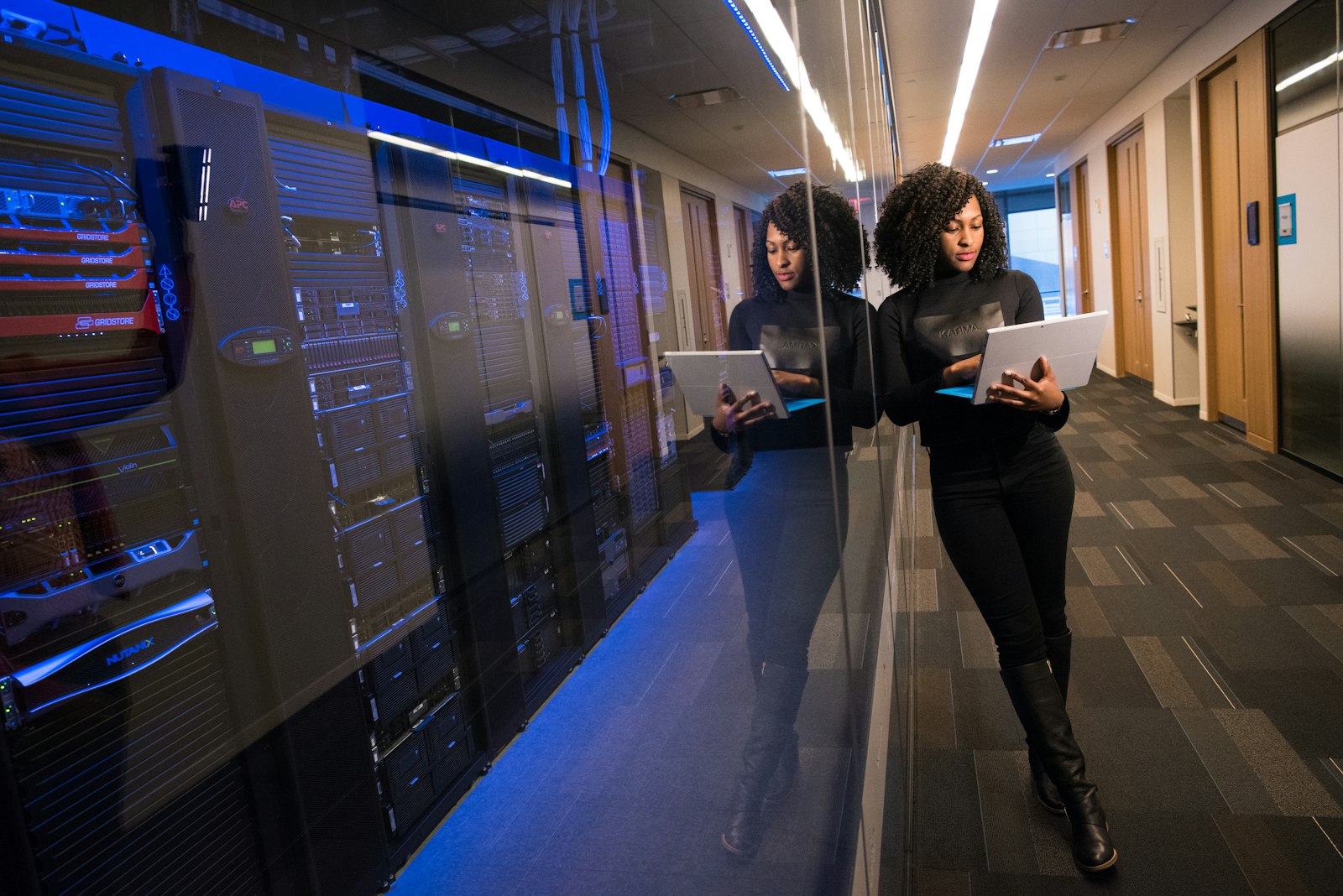 Diverse IT professional working in a modern data center